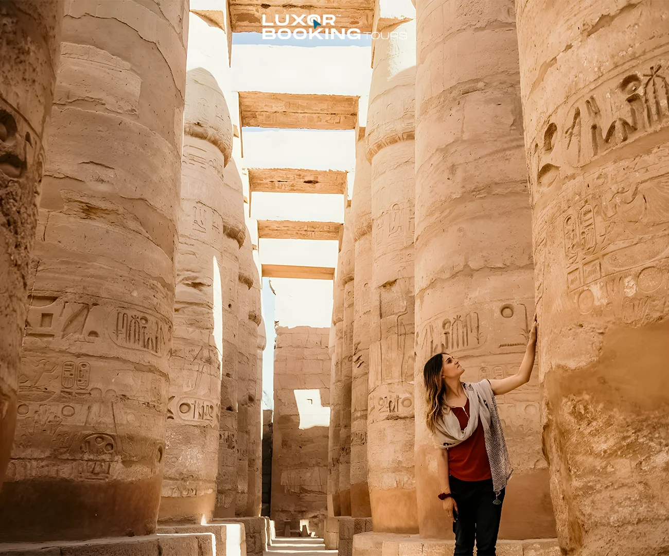 Solo traveler exploring Luxor with guide