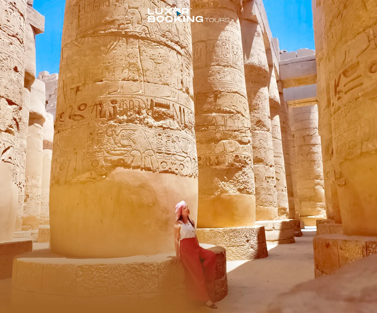 Independent traveler exploring an ancient Luxor temple quietly