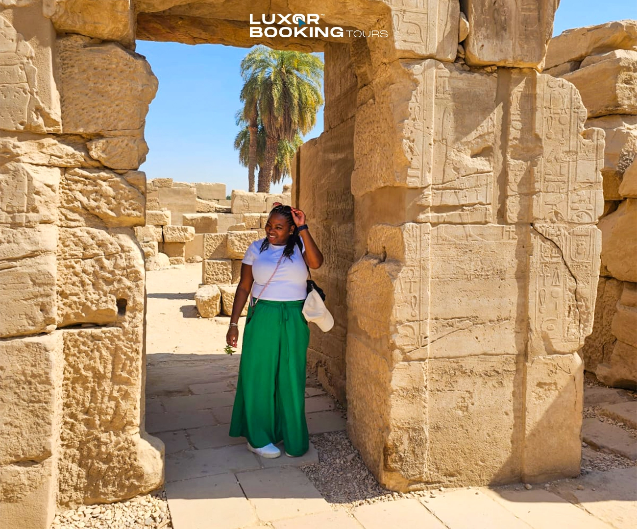 tourists reviewing Luxor tour prices and planning their trip