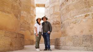 tourists discussing luxor tour options with a guide
