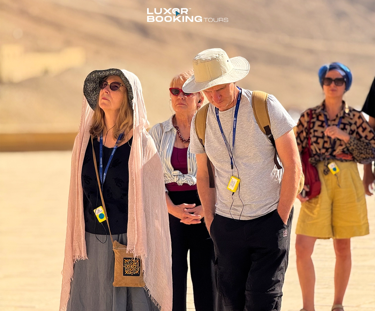 tourists wearing light clothing while visiting luxor temples