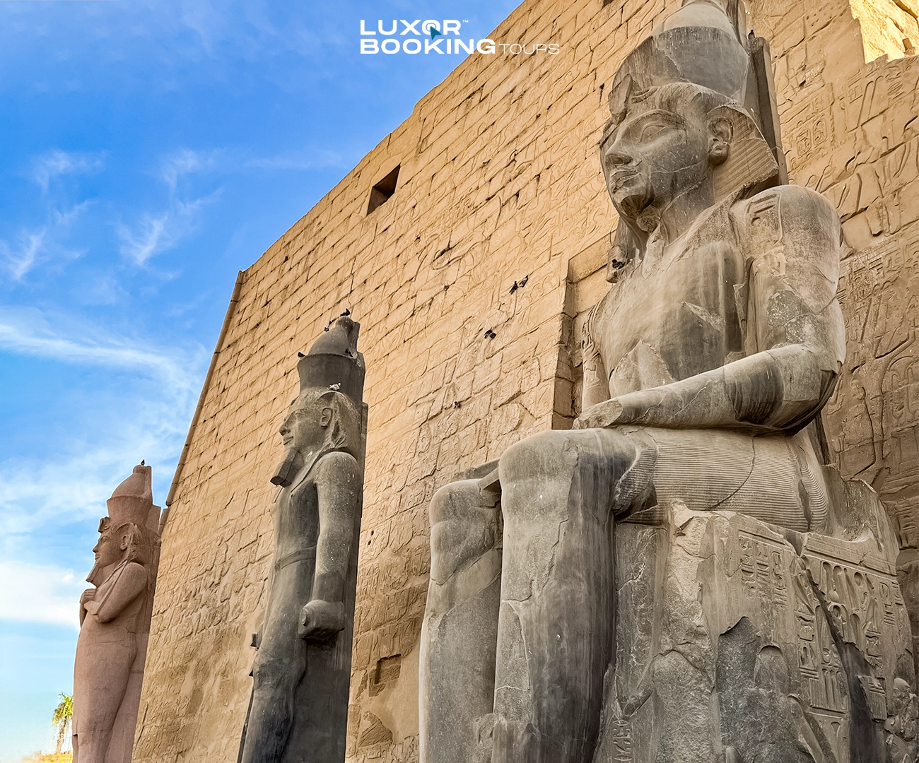 tourist buying tickets at luxor temple entrance