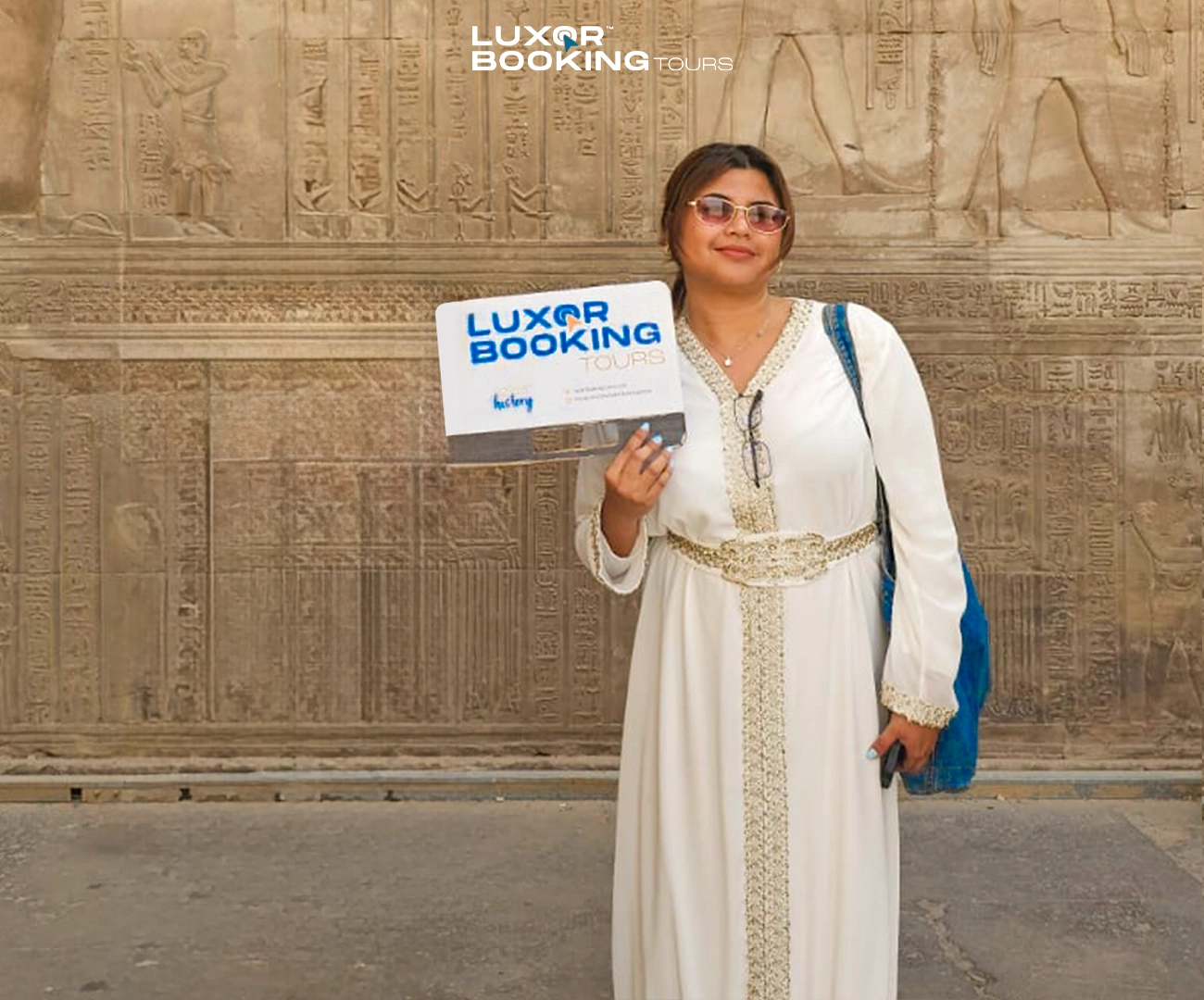 tourist interacting with local vendor in luxor market
