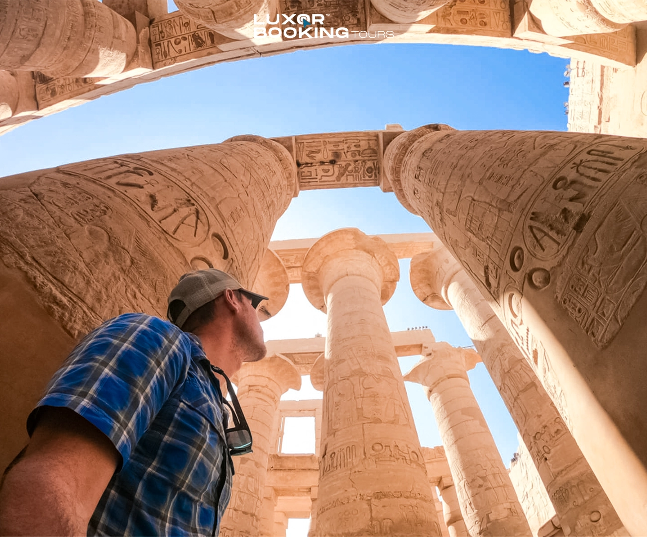 tired tourist resting at luxor temple after long day
