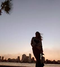 traveler looking over nile at sunset reflecting on egypt journey